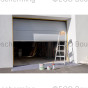 Overheaddeur na behandeling met Adler Epoxy Grund primer, klaar voor de volgende verflaag.
